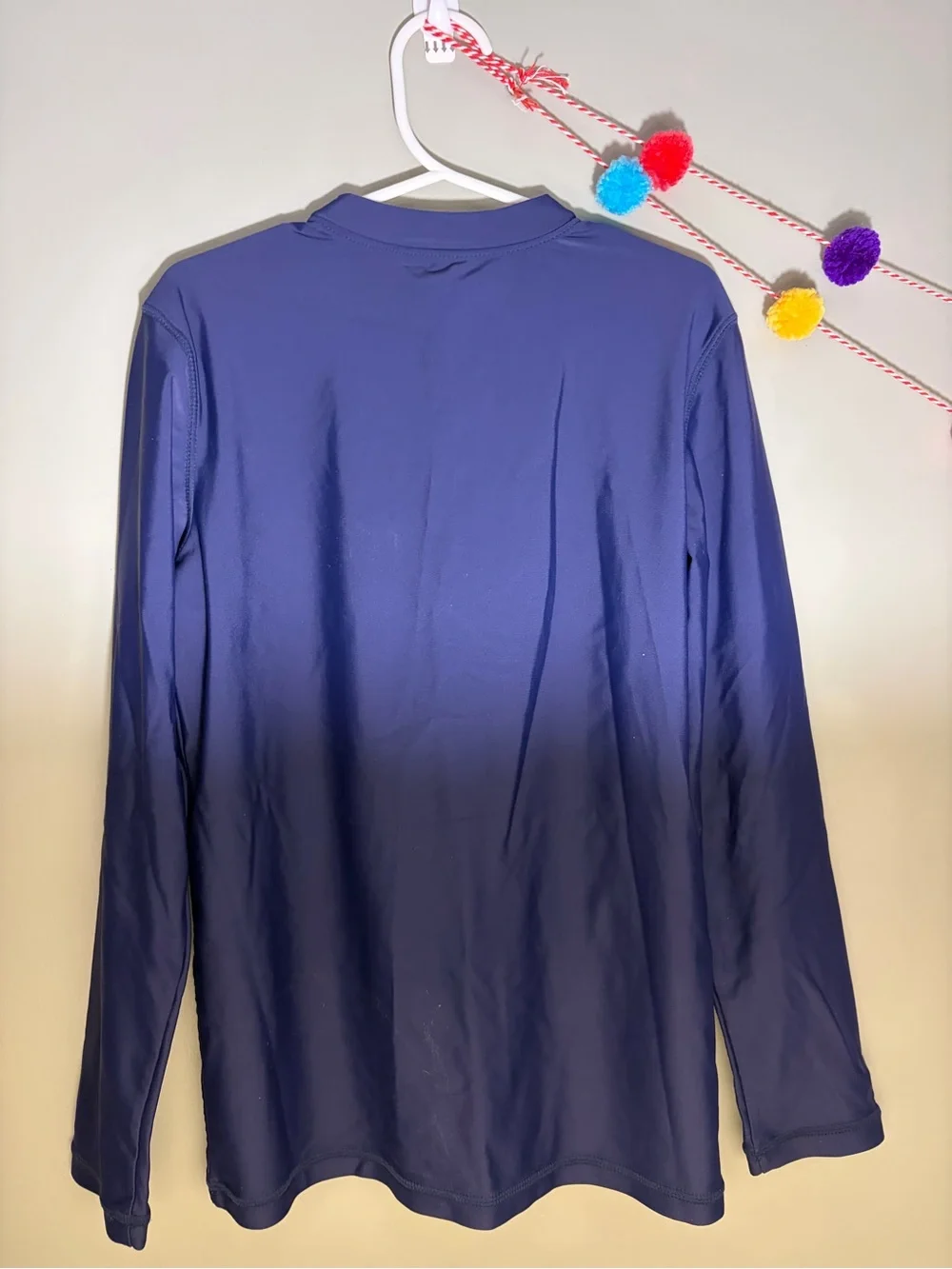 Primary rainbow stripe navy rash guard